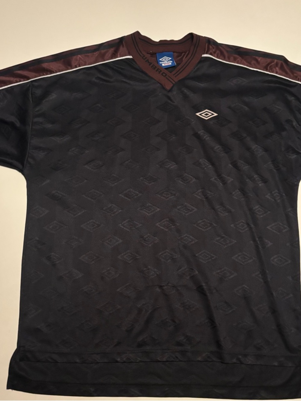 Vintage umbro all over print logo football style jersey